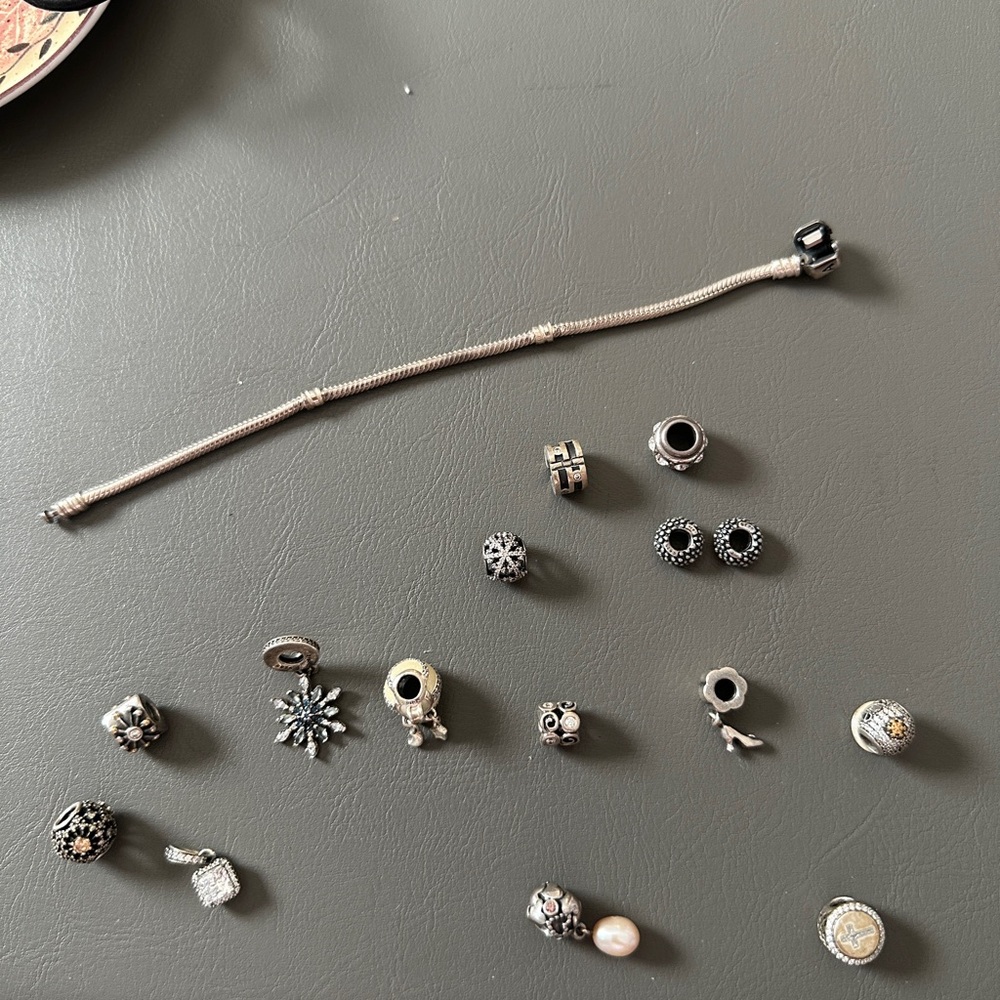 Pandora Bracelet w/14 charms worn about 3 times-dangling snowflake not included